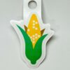 Sticker featuring a colorful ear of corn