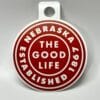 Sticker with Nebraska the Good Life saying on it