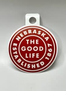 Sticker with Nebraska the Good Life saying on it
